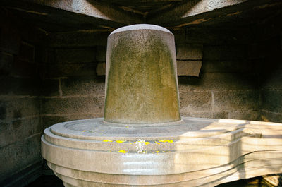 Close-up of cross against wall