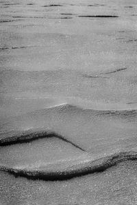 High angle view of surf on beach