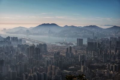 High angle view of buildings in city against sky