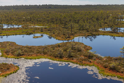 Scenic view of lake against sky during autumn