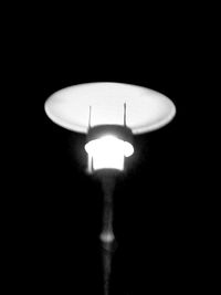 Close-up of illuminated light bulb