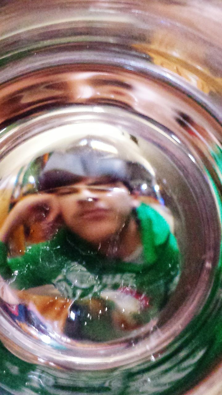 close-up, reflection, bubble, transparent, water, glass - material, full frame, motion, indoors, backgrounds, drop, circle, refreshment, glass, one person, multi colored, wet, abstract, pattern, splashing