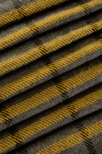 Woolen cloth, grey and yellow colors, pattern texture background