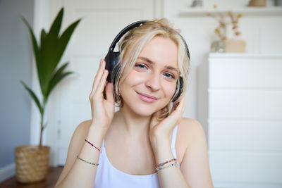 Portrait of young woman with eyes closed