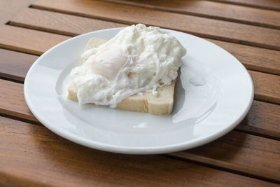 High angle view of cake in plate on table