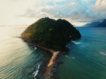 Scenic view of sea against cloudy sky