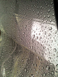 Close-up of water drops on glass