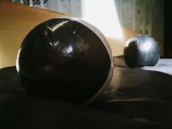 Close-up of crystal ball on table