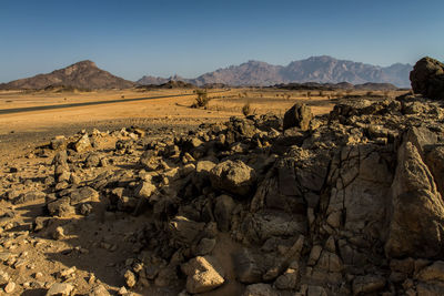 Scenic view of rocky mountains against clear sky