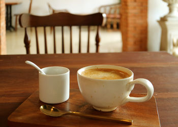 Close-up of coffee cup on table