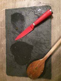 High angle view of red leaf on table