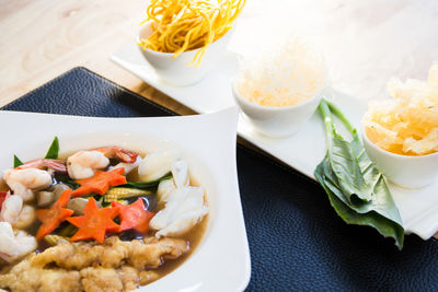 High angle view of food served on table