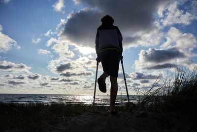 Rear view of man on beach