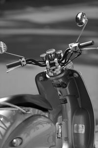 Close-up of bicycle parked on street