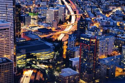 High angle view of illuminated cityscape at night