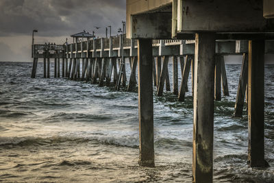 Pier over sea against sky