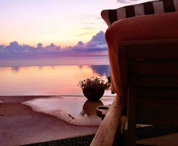 Scenic view of lake at sunset
