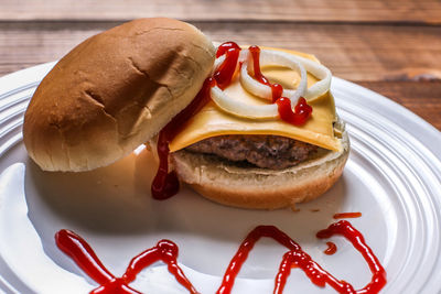 Close-up of burger in plate on table