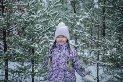 Portrait of smiling girl during winter