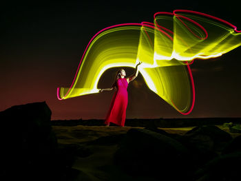 Woman with multi colored umbrella