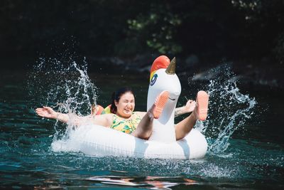 People enjoying in swimming pool