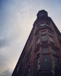 Low angle view of old building against sky