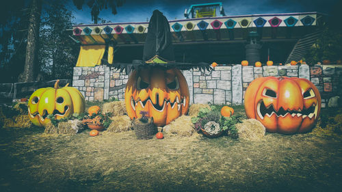 View of pumpkins against graffiti