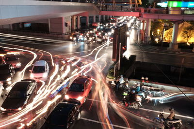 Light trails on city street at night