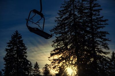 Low angle view of silhouette tree against sky at sunset