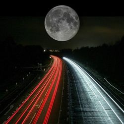 Light trails on road at night