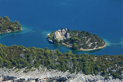 Aerial salt lakes and benedictine monastery on mljet island, adriatic sea, croatia