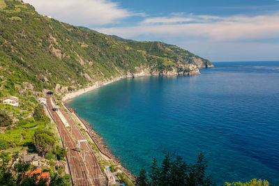 Panoramic overview and rail road of ligurian seaside  at cinque terre area,  italy,  june, 2019.