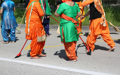 People walking on road in city