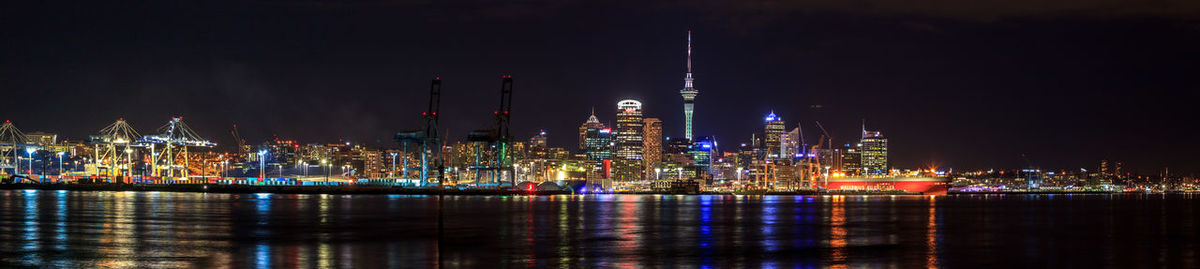 Illuminated buildings in city at night