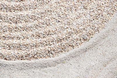 Full frame shot of pebbles on field