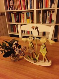 Flower vase on table at home