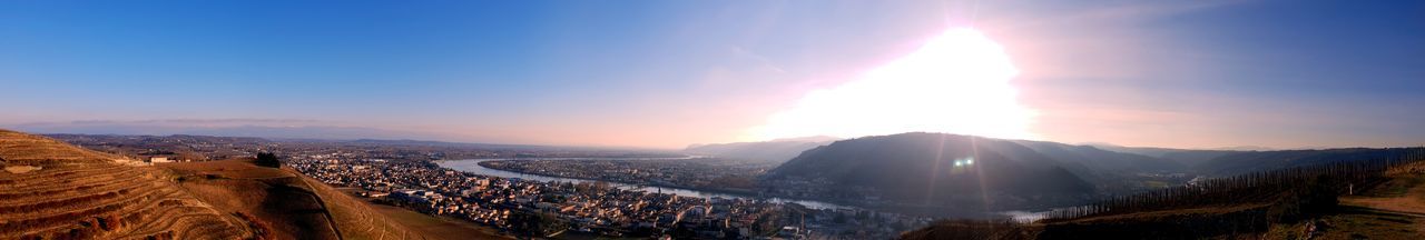 Panoramic view of landscape against sky during sunset