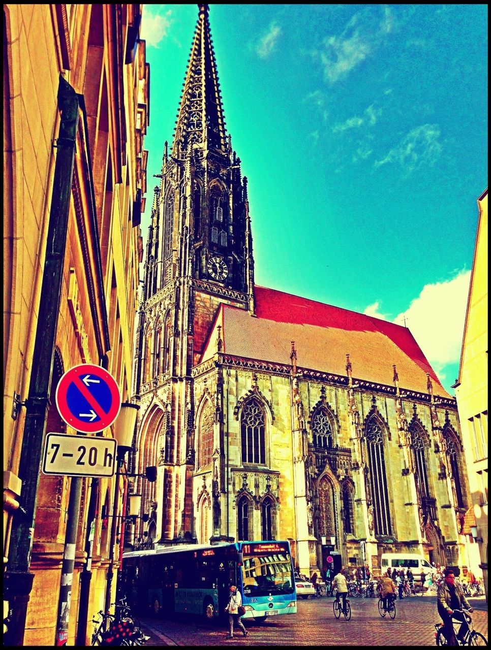 architecture, building exterior, built structure, city, low angle view, street, sky, church, incidental people, car, place of worship, transportation, religion, travel destinations, travel, famous place, land vehicle, city life, facade