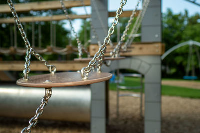 Close-up of swing at playground