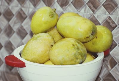 High angle view of fruits in bowl on table