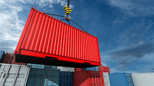 Low angle view of red building against sky