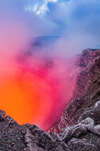 Scenic view of volcanic mountain against sky