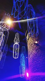 Low angle view of illuminated light painting at night