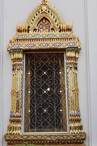Low angle view of ornate door of building