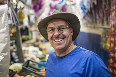 Portrait of elderly tourist in local guatemalan market.