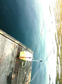 High angle view of sailboat moored on lake