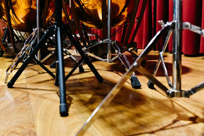 Close-up of piano keys on hardwood floor