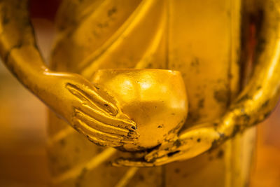 Close-up of yellow sculpture