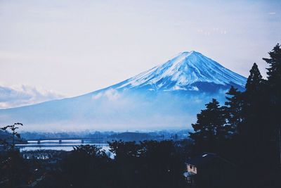 Scenic view of snow covered mountains