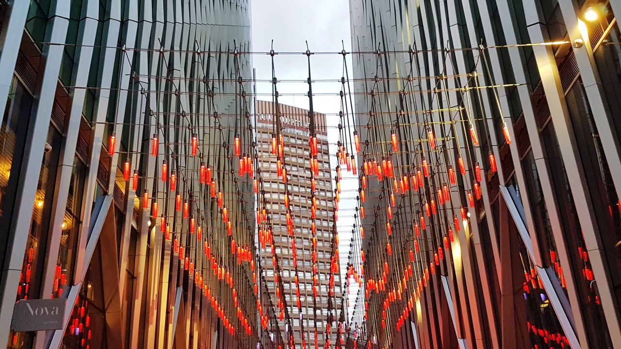 LOW ANGLE VIEW OF ILLUMINATED BUILDING